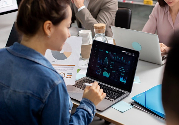 The Scalynops Technologies team reviewing campaign data together